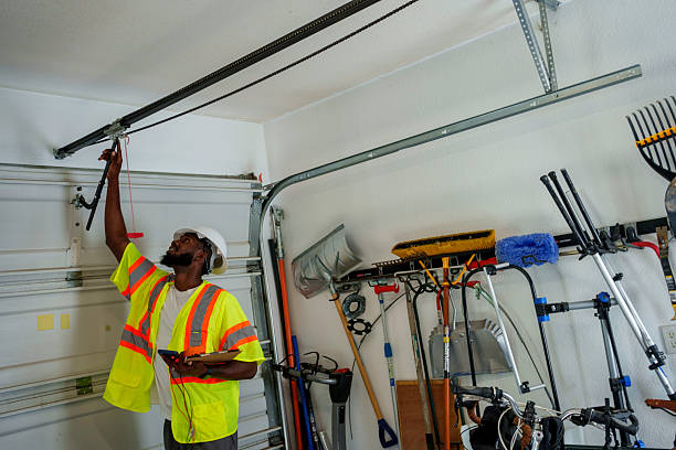 Professional Garage Door technician working in Carnot-Moon, PA